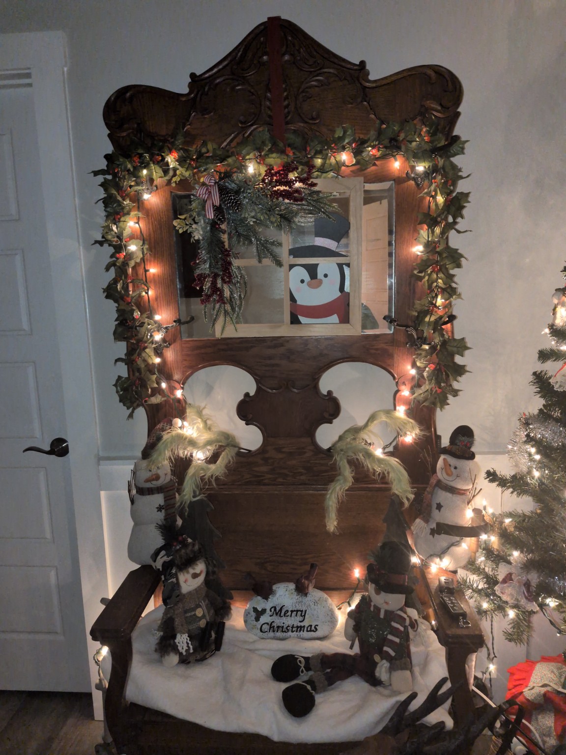 Family hall tree decorated for Christmas