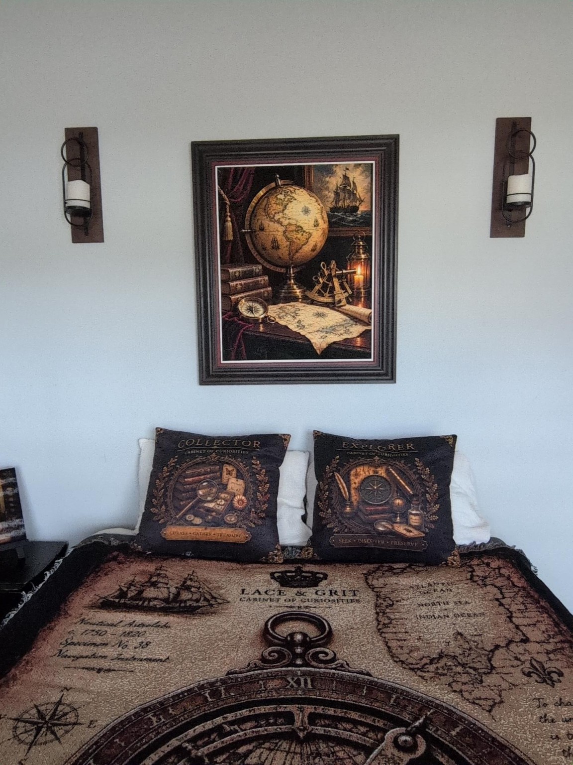 Cabinet of Curiosities guest room with Roxie's artwork, pillow designs and woven throw