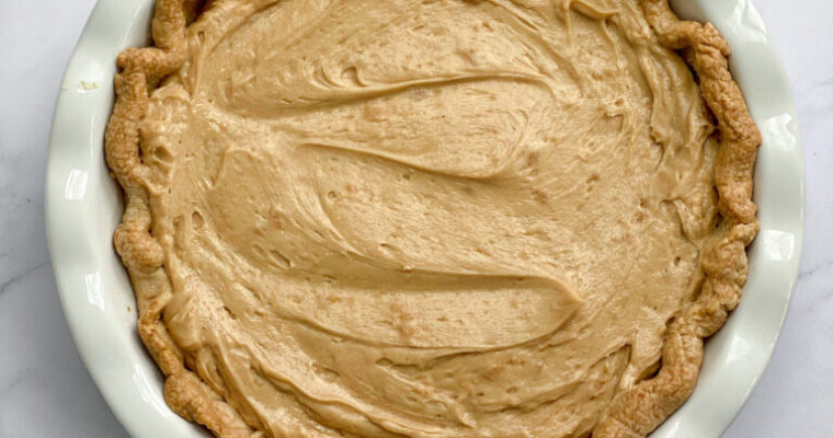 Old-fashioned peanut butter pie with creamy peanut butter filling in a pastry crust